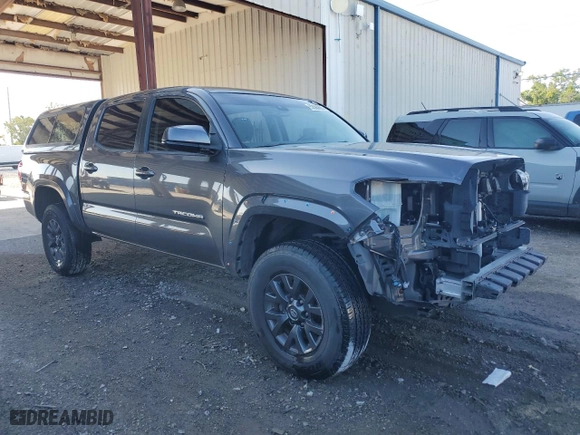 2021 Toyota Tacoma 2WD SR5 with VIN 5TFAZ5CN4MX105040, listed as a Copart auction lot 52088885 with 38,942 mi miles and Salvage Title. Bid and sale history available at carsss.com. Image 4.