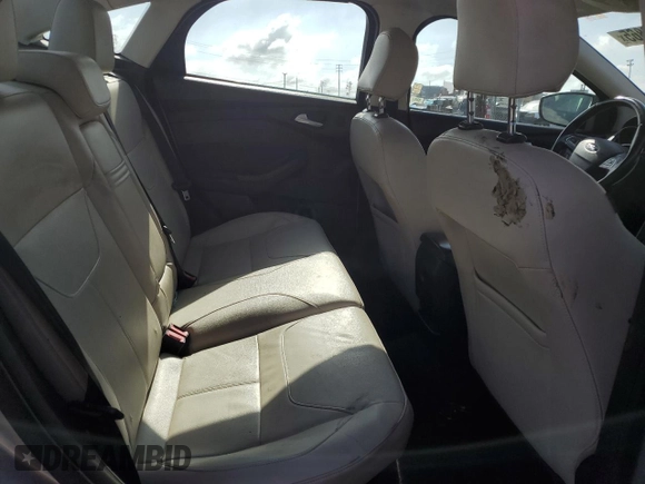 2015 Ford Focus Titanium с VIN 1FADP3J28FL288037, выставлен на аукционе Copart как лот 56972865 с пробегом 75 703 миль миль и Списание • Salvage title. История ставок и продаж доступна на DreamBid. Изображение 10.