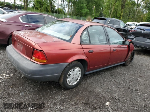 1997 Saturn SL z VIN 1G8ZH5285VZ188074, wystawiony jako Copart lot #51501005 z przebiegiem 125 973 mil mil oraz Nie do naprawy • Non repairable. Historia ofert i sprzedaży dostępna na DreamBid. Obrazek 3.