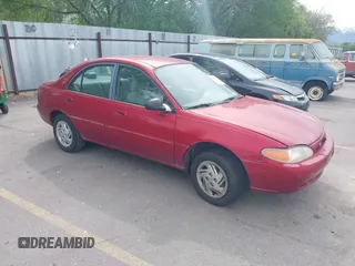 1997 Ford Escort LX z VIN 1FALP13P5VW116022, wystawiony jako IAAI lot #42278533 z przebiegiem 165 981 mil mil oraz . Historia ofert i sprzedaży dostępna na DreamBid. Obrazek 1.