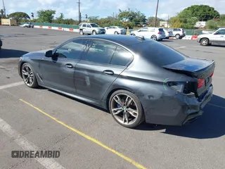 2018 BMW 5 Series M550i xDrive with VIN WBAJB9C51JB049513, listed as a IAAI auction lot 41146990 with 51,218 mi miles. Bid and sale history available at carsss.com. Image 3.