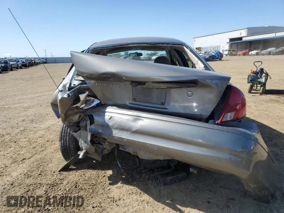 2002 Ford Taurus SE Standard with VIN 1FAFP53U12G271134, listed as a Copart auction lot 51671555 with 65,311 mi miles and Salvage title. Bid and sale history available at DreamBid. Image 6.