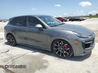 2017 Porsche Cayenne GTS with VIN WP1AD2A24HLA82506, listed as a Copart auction lot 57080515 with 150,113 mi miles and Clean title. Bid and sale history available at DreamBid. Image 4.