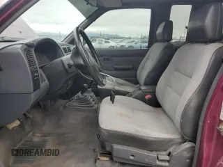 1995 Nissan Frontier SE z VIN 1N6HD16Y0SC364833, wystawiony jako Copart lot #48259485 z przebiegiem 152 592 mil mil oraz Szkoda całkowita • Salvage title. Historia ofert i sprzedaży dostępna na DreamBid. Obrazek 7.