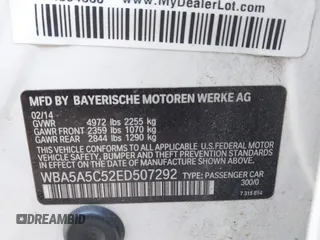 2014 BMW 5 Series 528i with VIN WBA5A5C52ED507292, listed as a IAAI auction lot 41930226 with 98,591 mi miles. Bid and sale history available at carsss.com. Image 9.