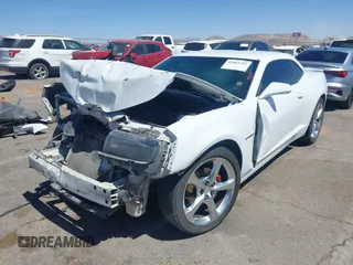 2014 Chevrolet Camaro LT z VIN 2G1FB1E31E9134616, wystawiony jako IAAI lot #41862352 z przebiegiem 115 300 mil mil oraz . Historia ofert i sprzedaży dostępna na DreamBid. Obrazek 2.