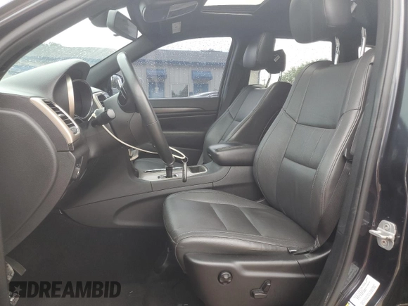 2014 Jeep Grand Cherokee Laredo with VIN 1C4RJEAGXEC130094, listed as a Copart auction lot 55997925 with 151,407 mi miles and Salvage Title. Bid and sale history available at DreamBid. Image 7.