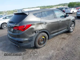 2013 Hyundai Santa Fe Sport z VIN 5XYZW3LA3DG068434, wystawiony jako IAAI lot #42167040 z przebiegiem 140 928 mil mil oraz . Historia ofert i sprzedaży dostępna na DreamBid. Obrazek 4.