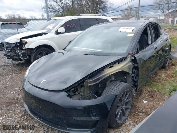 2019 Tesla Model 3 Mid Range with VIN 5YJ3E1EA2KF317028, listed as a IAAI auction lot 41781580 with 107,496 mi miles. Bid and sale history available at carsss.com. Image 20.
