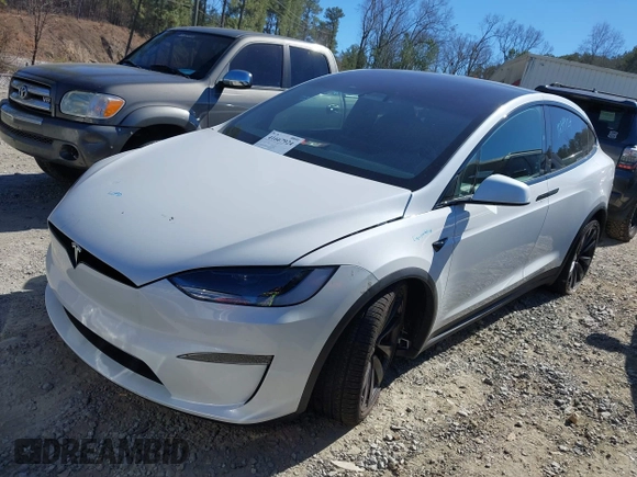 2023 Tesla Model X with VIN 7SAXCDE54PF430808, listed as a IAAI auction lot 41667924 with 21,100 mi miles and . Bid and sale history available at DreamBid. Image 19.
