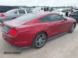2015 Ford Mustang EcoBoost z VIN 1FA6P8THXF5349965, wystawiony jako IAAI lot #42107250 z przebiegiem 104 475 mil mil oraz . Historia ofert i sprzedaży dostępna na DreamBid. Obrazek 4.