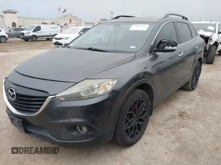 2013 Mazda CX-9 Grand Touring with VIN JM3TB2DA1D0401785, listed as a IAAI auction lot 42034331 with 128,146 mi miles and . Bid and sale history available at DreamBid. Image 2.