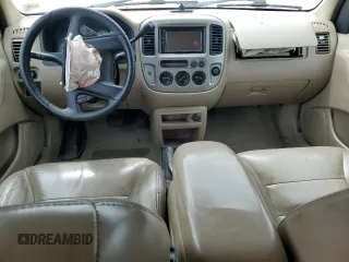 2003 Ford Escape XLT Popular with VIN 1FMCU03113KD48108, listed as a Copart auction lot 60978095 with 201,604 mi miles and Salvage title. Bid and sale history available at DreamBid. Image 8.