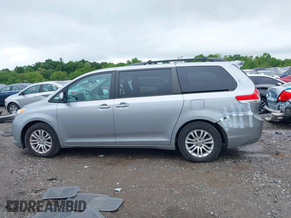 2012 Toyota Sienna XLE AAS with VIN 5TDYK3DC2CS205856, listed as a IAAI auction lot 42230009 with 136,588 mi miles and . Bid and sale history available at DreamBid. Image 14.