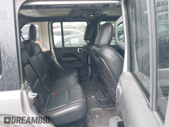 2018 Jeep Wrangler Unlimited Rubicon with VIN 1C4HJXFG4JW174603, listed as a IAAI auction lot 42202302 with 120,229 mi miles and . Bid and sale history available at DreamBid. Image 8.