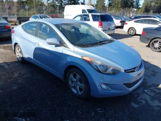 2013 Hyundai Elantra GLS PZEV with VIN KMHDH4AE9DU798844, listed as a IAAI auction lot 41514977 with 72,377 mi miles. Bid and sale history available at carsss.com. Image 1.