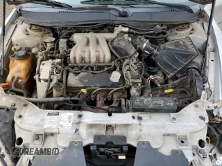 2000 Ford Taurus SE with VIN 1FAFP532XYA141783, listed as a Copart auction lot 43949795 with 203,939 mi miles and Salvage Title. Bid and sale history available at DreamBid. Image 11.