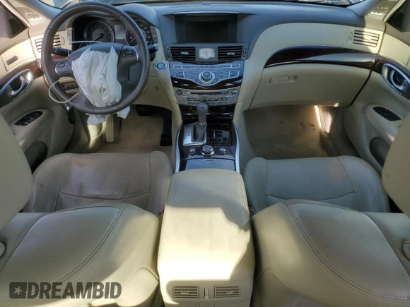 2012 Infiniti M37 with VIN JN1BY1AP8CM333839, listed as a Copart auction lot 84052134 with 121,979 mi miles and Salvage Title. Bid and sale history available at carsss.com. Image 8.