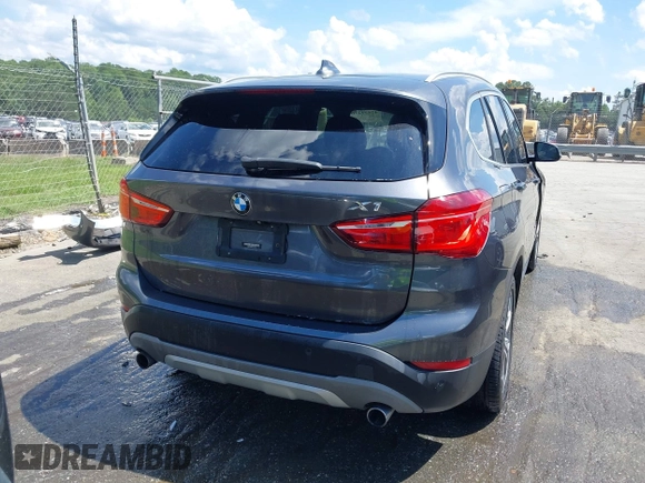 2017 BMW X1 xDrive28i with VIN WBXHT3Z38H4A55086, listed as a IAAI auction lot 42459276 with 101,907 mi miles and . Bid and sale history available at DreamBid. Image 16.
