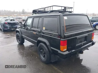 1996 Jeep Cherokee SE with VIN 1J4FJ28S9TL135564, listed as a IAAI auction lot 41618367 with 249,410 mi miles and . Bid and sale history available at DreamBid. Image 3.
