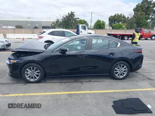 2021 Mazda 3 S with VIN 3MZBPAAL8MM254767, listed as a IAAI auction lot 42813614 with 31,704 mi miles and . Bid and sale history available at DreamBid. Image 14.