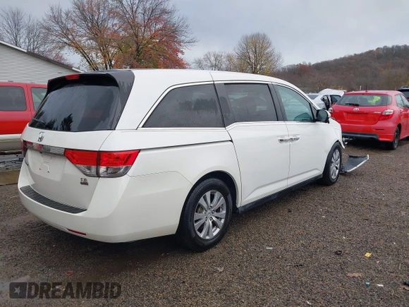 2016 Honda Odyssey EX-L z VIN 5FNRL5H63GB090003, wystawiony jako IAAI lot #40966761 z przebiegiem 67 971 mil mil oraz . Historia ofert i sprzedaży dostępna na DreamBid. Obrazek 4.