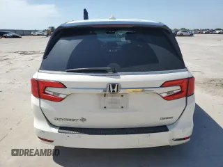 2019 Honda Odyssey Touring with VIN 5FNRL6H86KB089055, listed as a Copart auction lot 56980975 with 154,842 mi miles and Salvage title. Bid and sale history available at DreamBid. Image 6.
