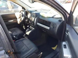 2017 Jeep Compass Latitude with VIN 1C4NJDEB0HD190200, listed as a IAAI auction lot 41733462 with 77,374 mi miles and . Bid and sale history available at DreamBid. Image 5.