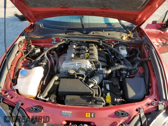 2023 Mazda MX-5 Miata Grand Touring with VIN JM1NDAM71P0559428, listed as a Copart auction lot 76596984 with 7,237 mi miles and Salvage title. Bid and sale history available at DreamBid. Image 12.