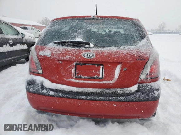 2009 Kia Rio LX with VIN KNADE243596480661, listed as a Copart auction lot 87673065 with 128,733 mi miles and Clean Title. Bid and sale history available at carsss.com. Image 6.