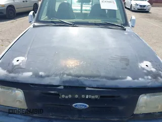 1994 Ford Ranger XLT z VIN 1FTCR10X2RPC62161, wystawiony jako IAAI lot #42436822 z przebiegiem 234 051 mil mil oraz . Historia ofert i sprzedaży dostępna na DreamBid. Obrazek 6.
