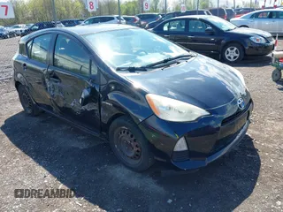 2013 Toyota Prius One with VIN JTDKDTB36D1034028, listed as a IAAI auction lot 42172387 with 245,325 mi miles. Bid and sale history available at carsss.com. Image 1.