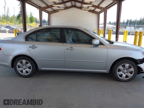 2009 Kia Optima LX z VIN KNAGE228795357008, wystawiony jako IAAI lot #42228948 z przebiegiem 148 194 mil mil oraz . Historia ofert i sprzedaży dostępna na DreamBid. Obrazek 13.