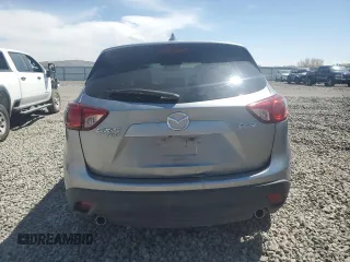 2015 Mazda CX-5 Grand Touring with VIN JM3KE4DY5F0540655, listed as a Copart auction lot 52893155 with 152,279 mi miles and Salvage Title. Bid and sale history available at carsss.com. Image 6.