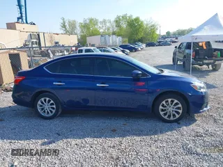 2019 Nissan Sentra S z VIN 3N1AB7AP5KY226078, wystawiony jako IAAI lot #42004553 z przebiegiem 133 164 mil mil oraz . Historia ofert i sprzedaży dostępna na DreamBid. Obrazek 13.