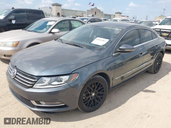 2013 Volkswagen CC Sport with VIN WVWBN7AN2DE518150, listed as a IAAI auction lot 42011967 with 115,127 mi miles and . Bid and sale history available at DreamBid. Image 2.