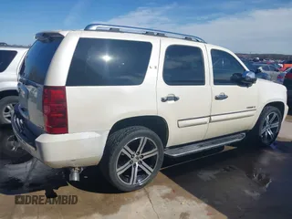 2008 Chevrolet Tahoe LTZ with VIN 1GNFK13078R190092, listed as a IAAI auction lot 41690795 with 147,041 mi miles and . Bid and sale history available at DreamBid. Image 4.