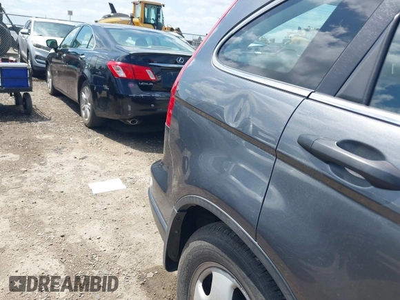 2011 Honda CR-V LX with VIN 5J6RE4H30BL107897, listed as a IAAI auction lot 42111503 with 198,356 mi miles. Bid and sale history available at carsss.com. Image 6.