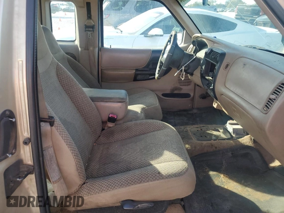 1999 Ford Ranger XLT with VIN 1FTYR14X1XPB75400, listed as a Copart auction lot 80879084 with 255,136 mi miles and Salvage Title. Bid and sale history available at DreamBid. Image 10.
