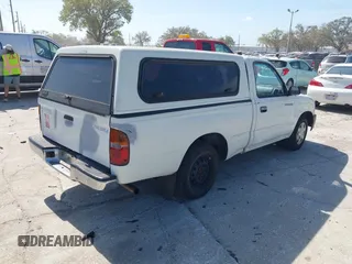 1998 Toyota Tacoma with VIN 4TANL42N2WZ022014, listed as a IAAI auction lot 41721566 with 175,566 mi miles. Bid and sale history available at carsss.com. Image 4.