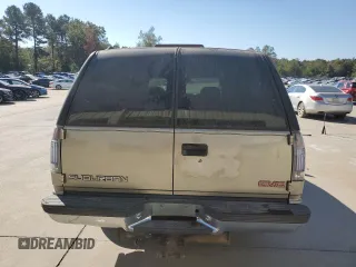 1999 GMC Suburban with VIN 3GKEC16R7XG542862, listed as a Copart auction lot 77568734 with 251,717 mi miles and Salvage Title. Bid and sale history available at carsss.com. Image 6.