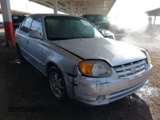 2003 Hyundai Accent GL with VIN KMHCG45C93U476176, listed as a IAAI auction lot 41940608 with 212,264 mi miles. Bid and sale history available at carsss.com. Image 1.