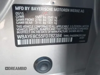 2015 BMW 7 Series 750Li with VIN WBAYE8C55FD782384, listed as a IAAI auction lot 41319363 with 75,784 mi miles. Bid and sale history available at carsss.com. Image 9.