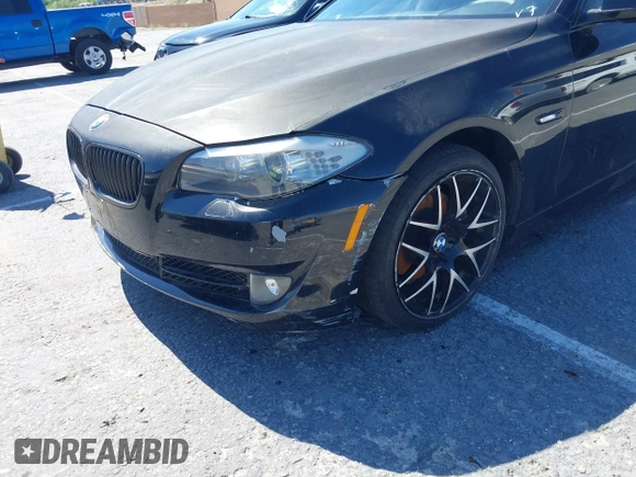 2013 BMW 5 Series 528i with VIN WBAXG5C50DDY35638, listed as a IAAI auction lot 39657715 with 139,765 mi miles and . Bid and sale history available at carsss.com. Image 12.