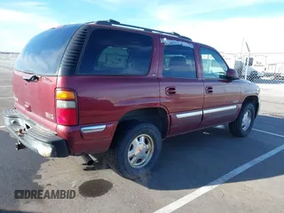 2001 GMC Yukon SLT with VIN 1GKEK13T71J173316, listed as a IAAI auction lot 41362648 with 276,222 mi miles. Bid and sale history available at carsss.com. Image 4.