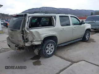 2014 GMC Yukon XL SLT with VIN 1GKS2KE71ER223496, listed as a IAAI auction lot 41419800 with 146,686 mi miles. Bid and sale history available at carsss.com. Image 4.