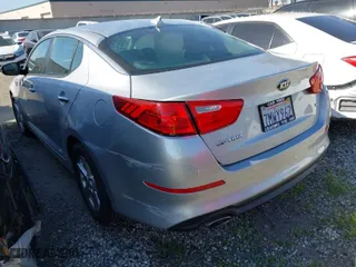 2015 Kia Optima LX with VIN 5XXGM4A71FG466873, listed as a IAAI auction lot 41851355 with 13,880 mi miles. Bid and sale history available at carsss.com. Image 3.