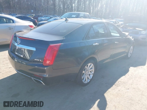 2014 Cadillac CTS Luxury RWD with VIN 1G6AR5SX0E0180611, listed as a IAAI auction lot 41366268 with 122,040 mi miles. Bid and sale history available at carsss.com. Image 4.