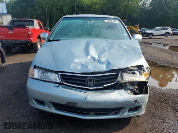 2003 Honda Odyssey EX-L с VIN 2HKRL18033H501741, выставлен на аукционе Copart как лот 60496865 с пробегом Не указан миль и Списание • Salvage title. История ставок и продаж доступна на DreamBid. Изображение 5.