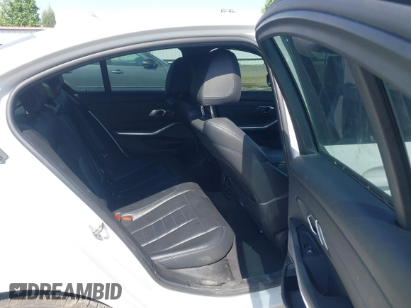 2019 BMW 3 Series 330i xDrive with VIN WBA5R7C52KAJ82760, listed as a IAAI auction lot 42485304 with 43,298 mi miles and . Bid and sale history available at DreamBid. Image 8.